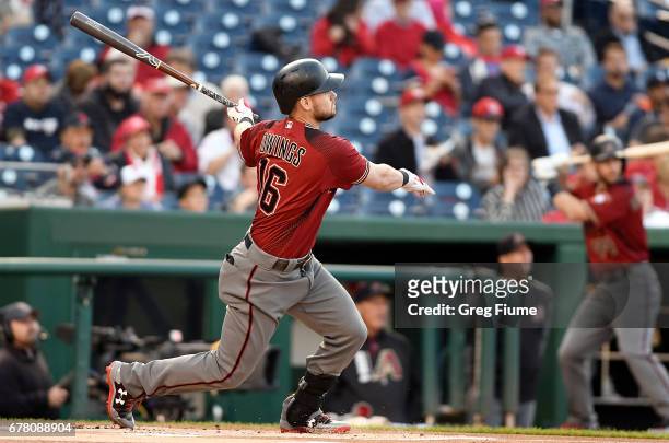 Chris Owings of the Arizona Diamondbacks hits a home run in the first inning against the Washington Nationals at Nationals Park on May 3, 2017 in...