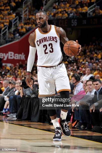 LeBron James of the Cleveland Cavaliers handles the ball against the Toronto Raptors during Game Two of the Eastern Conference Semifinals of the 2017...