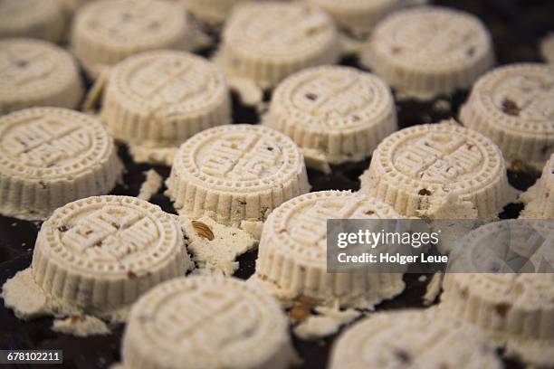 macanese almond cookies baked over heat basket - macao stock pictures, royalty-free photos & images