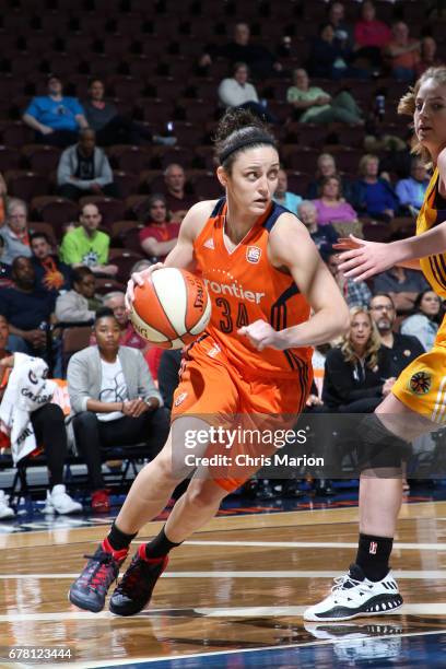 Kelly Faris of the Connecticut Sun handles the ball during a game against the Los Angeles Sparks on May 3, 2017 at Mohegan Sun Arena in Uncasville,...