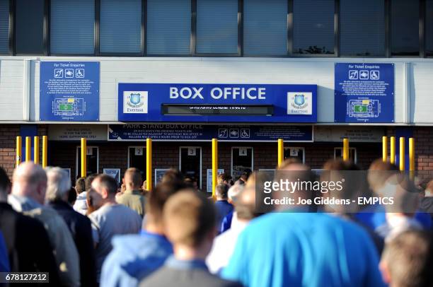 Fans queue outside Goodison Park before the game