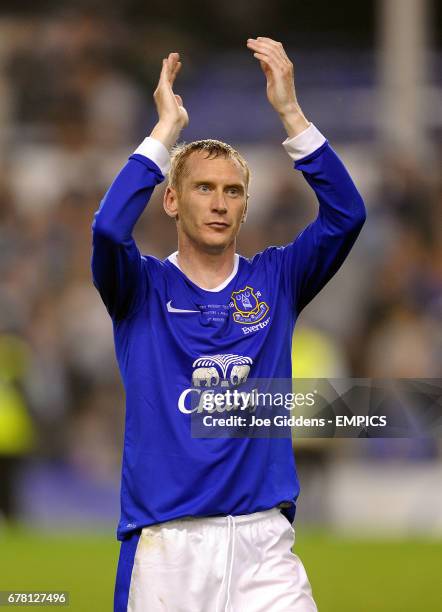 Everton's Tony Hibbert applauds the fans after his testimonial match