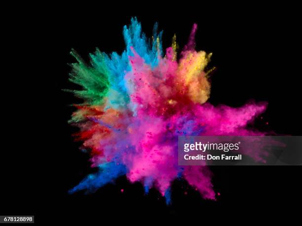 exploding colored powder - explosion stockfoto's en -beelden
