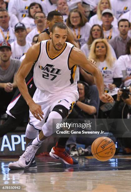 Rudy Gobert of the Utah Jazz chases a loose ball in the second half against the Los Angeles Clippers in Game Four of the Western Conference...