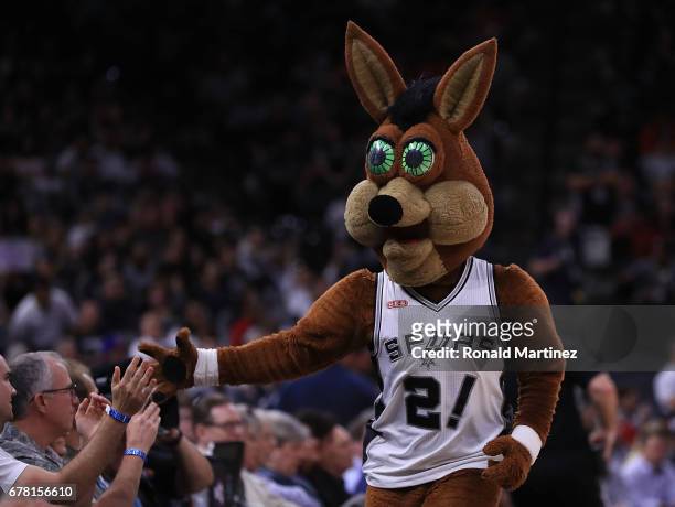 The mascot of the San Antonio Spurs walks the sideline during Game Two of the NBA Western Conference Semi-Finals against the Houston Rockets at AT&T...
