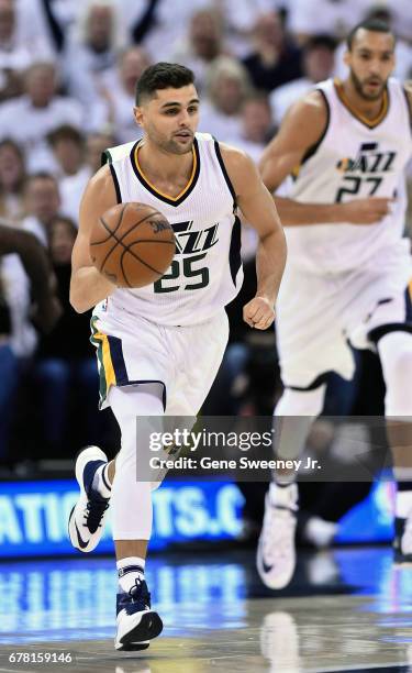 Raul Neto of the Utah Jazz brings the ball up court in the first half against the Los Angeles Clippers in Game Six of the Western Conference...