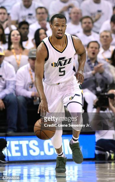 Rodney Hood of the Utah Jazz brings the ball up court in the first half against the Los Angeles Clippers in Game Six of the Western Conference...