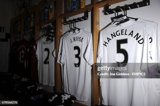 Fulham shirts for Brede Hangeland, John Arne Riise and Stephen Kelly in the dressing room