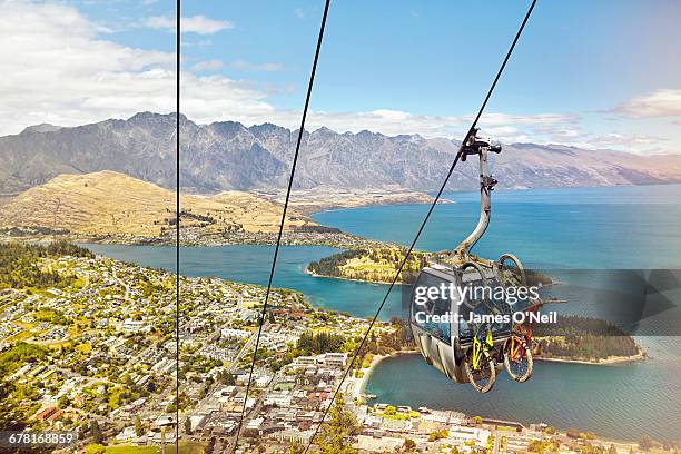 gondola with bikes in queenstown and lake wakatipu - lake wakatipu stock pictures, royalty-free photos & images