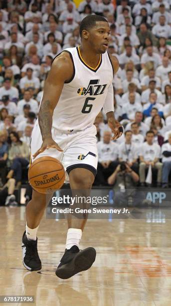 Joe Johnson of the Utah Jazz controls the ball in the first half against the Los Angeles Clippers in Game Six of the Western Conference Quarterfinals...