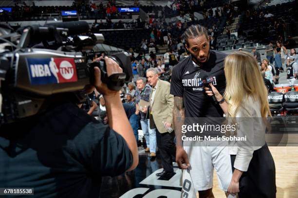 Kawhi Leonard of the San Antonio Spurs talks to the media after the game against the Houston Rockets during Game Two of the Eastern Conference...