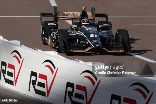 Hilderbrand, driver of the Ed Carpenter Racing Chevrolet drives out of the pitt area during practice for the Desert Diamond West Valley Phoenix Grand...