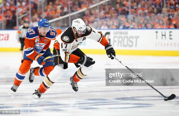 Connor McDavid of the Edmonton Oilers pursues Ryan Kesler of the Anaheim Ducks in Game Four of the Western Conference Second Round during the 2017...