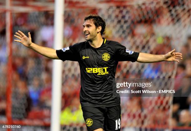 Wigan Athletic's Mauro Boselli celebrates scoring the opening goal