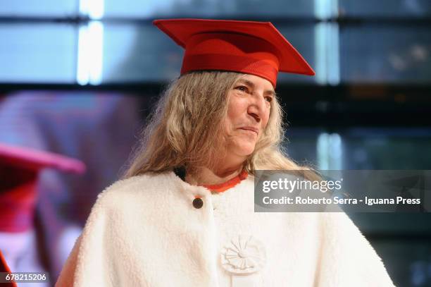 American musician and authoress Patti Smith receives an honorary degree in Literature from the University of Parma during a ceremony at Audtorium...