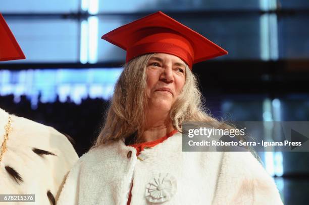 American musician and authoress Patti Smith receives an honorary degree in Literature from the University of Parma during a ceremony at Audtorium...