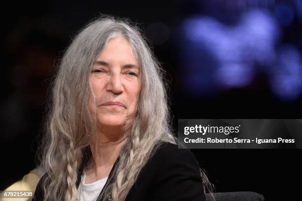 American musician and authoress Patti Smith receives an honorary degree in Literature from the University of Parma during a ceremony at Audtorium...