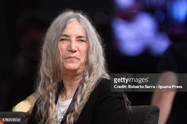 American musician and authoress Patti Smith receives an honorary degree in Literature from the University of Parma during a ceremony at Audtorium...