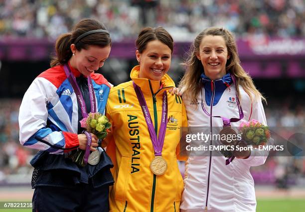 Great Britain's Stef Reid , Australia's Kelly Cartwright and France's Marie-Amelie le Fur receive their medals for the Women's Long Jump - F42/44