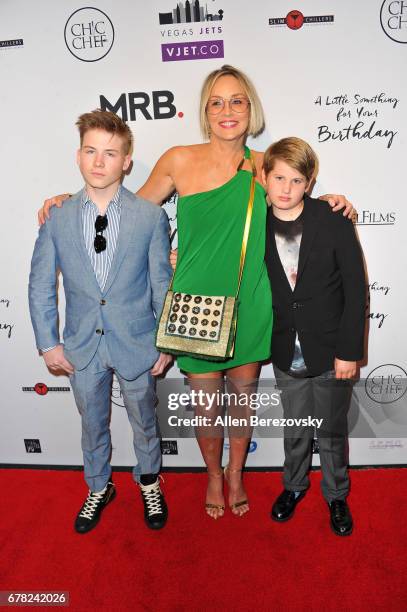 Roan Joseph Bronstein, Sharon Stone and Laird Vonne Stone attend the premiere of Penny Black Promotions' "A Little Something For Your Birthday" at...