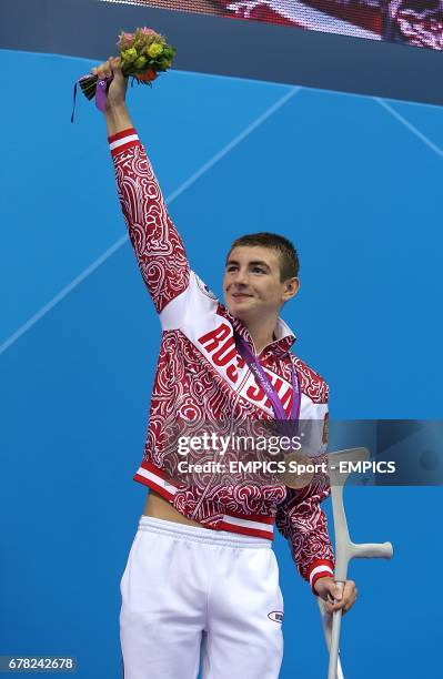 Russia's Andrey Gladkov with his Bronze Medal for the Men's 400m Freestyle - S7, during the Paralympic Games in London.