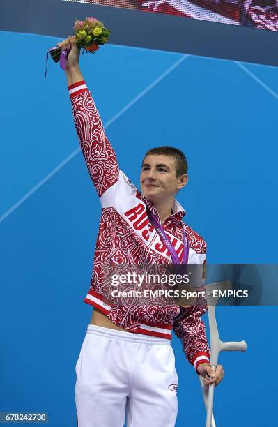 Russia's Andrey Gladkov with his Bronze Medal for the Men's 400m Freestyle - S7, during the Paralympic Games in London.