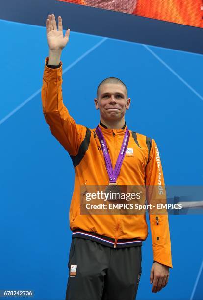 Bronze Medalist Netherland's Marc Evers after the Men's 100m Breaststroke - SB14 Final, during the Paralympic Games in London.