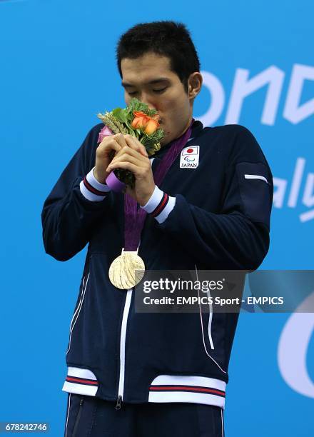 Gold Medalist Japan's Yasuhiro Tanaka after the Men's 100m Breaststroke - SB14 Final, during the Paralympic Games in London.