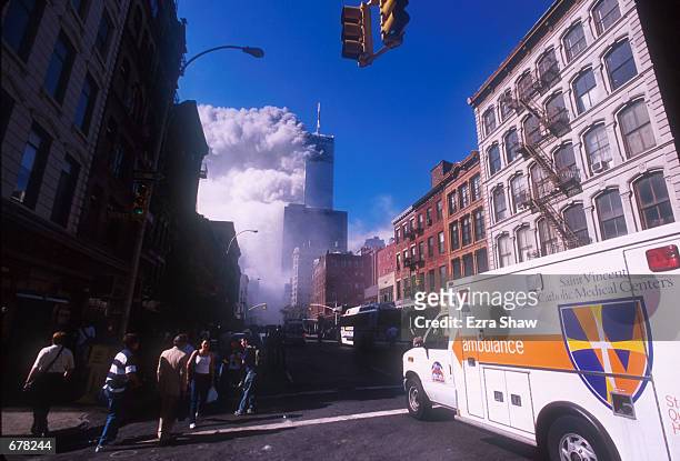 An ambulance rushes toward the World Trade Center area after the twin towers collapsed after being struck by a commerical airliner in a suspected...