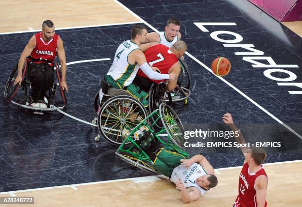 Australia's Shaun Norris falls over during the men's wheelchair basketball final between Australia and Canada at the North Greenwich Arena, London