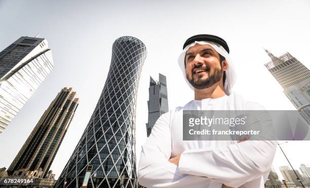 man looking the doha skyline in qatar - doha people stock pictures, royalty-free photos & images