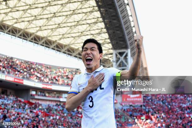 Gen Shoji of Kashima Antlers celebrates after his side's 1-0 victory in the J.League J1 match between Urawa Red Diamonds and Kashima Antlers at...