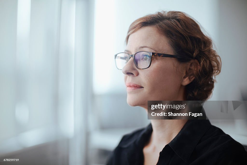 Businesswoman looking ahead in business office