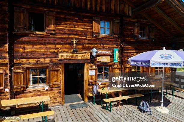 Fleidingalm, a traditional Alpine Hut made from Wood on August 05, 2015 in Hopfgarten, Tyrol, Austria.
