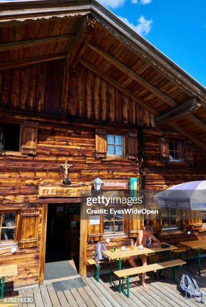 Fleidingalm, a traditional Alpine Hut made from Wood on August 05, 2015 in Hopfgarten, Tyrol, Austria.