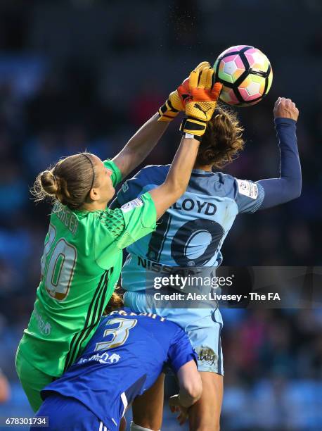 Ann-Katrin Berger of Birmingham City Ladies challenges Carli Lloyd of Manchester City Women for a high ball during the WSL 1 match between Manchester...