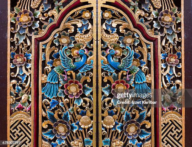 elegant door of balinese temple, denpasar, bali - denpasar fotografías e imágenes de stock