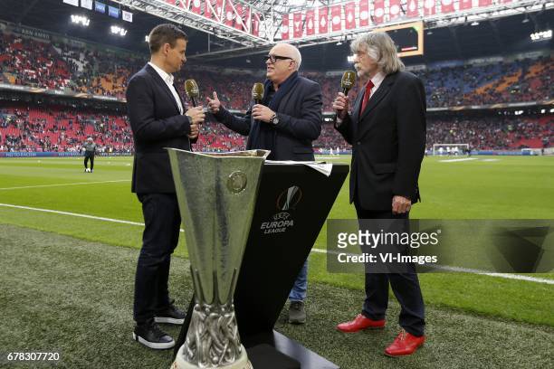 Presentator Wilfred Genee of RTL7, Ren van der Gijp, Johan Derksenduring the UEFA Europa League semi final match between Ajax Amsterdam and Olympique...