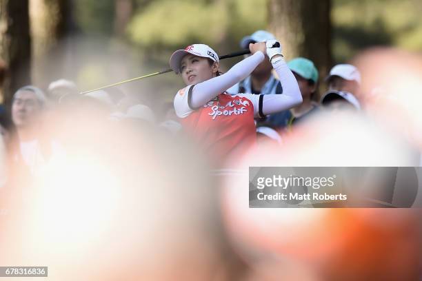 Bo-Mee Lee of South Korea hits her tee shot on the 3rd hole during the first round of the World Ladies Championship Salonpas Cup at the Ibaraki Golf...