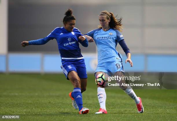 Jill Scott of Manchester City Women is tackled by Jessica Carter of Birmingham City Ladies during the WSL 1 match between Manchester City Women and...