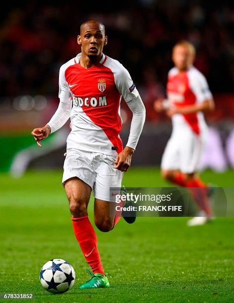 Monaco's Brazilian defender Fabinho controls the ball during the UEFA Champions League semi-final first leg football match between Monaco and...