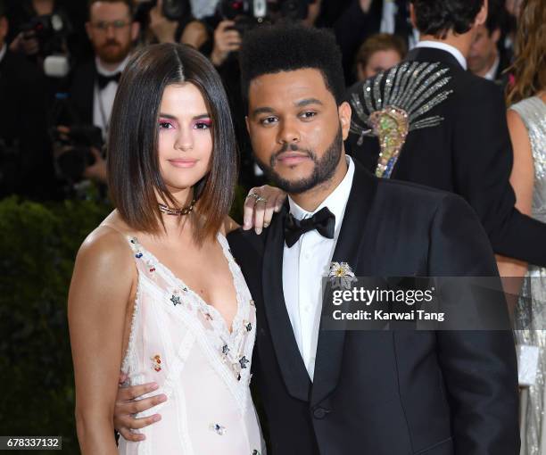 Selena Gomez and The Weeknd attend the "Rei Kawakubo/Comme des Garcons: Art Of The In-Between" Costume Institute Gala at the Metropolitan Museum of...