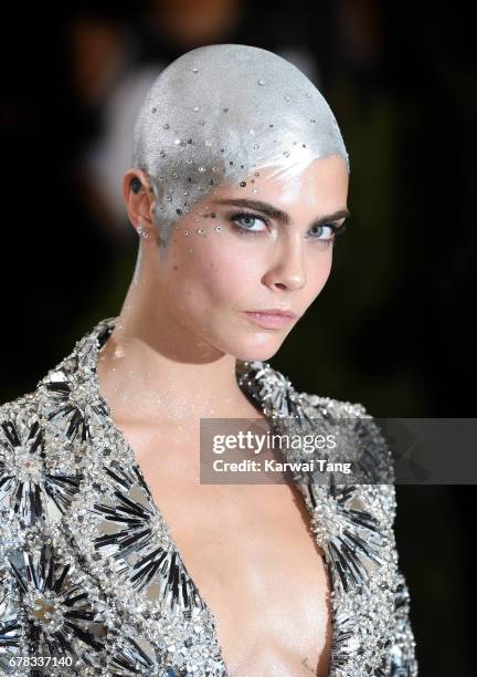 Cara Delevingne attends the "Rei Kawakubo/Comme des Garcons: Art Of The In-Between" Costume Institute Gala at the Metropolitan Museum of Art on May...