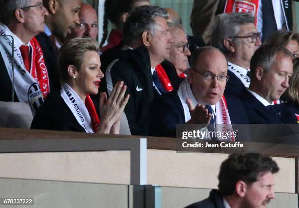Prince Albert II of Monaco and Princess Charlene of Monaco react after the second goal of Juventus during the UEFA Champions League semi final first...