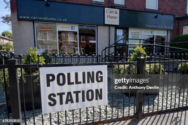 Sign directs to a polling station at Carr & Hume estate agents in Swinton during the Manchester Mayoral election on May 4, 2017 in Manchester,...