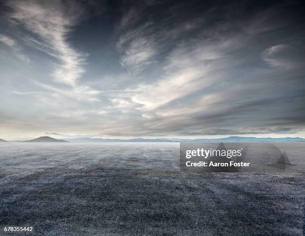 large parking lot - ominous sky stock pictures, royalty-free photos & images