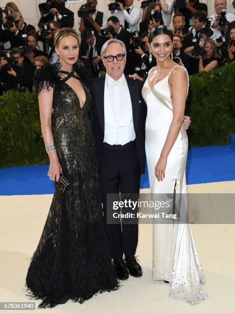 Dee Ocleppo, Tommy Hilfiger and Deepika Padukone attend the "Rei Kawakubo/Comme des Garcons: Art Of The In-Between" Costume Institute Gala at the...