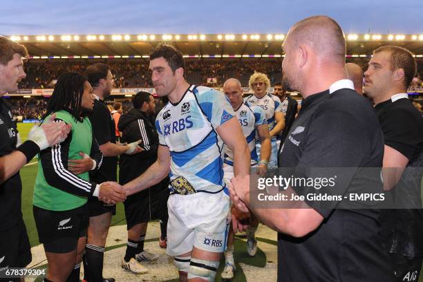 Scotland's Kelly Brown leaves the field dejected at fulltime