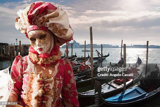 mask in san marco square during venice carnival, venice, unesco world heritage site, veneto, italy, europe - venice carnival 2013 stock pictures, royalty-free photos & images