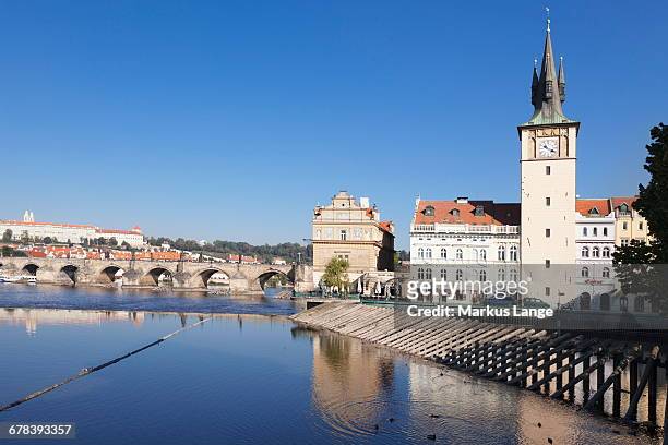 view over the river vltava to smetana museum, with charles bridge and the castle district in the distance, prague, bohemia, czech republic, europe - smetana museum stock pictures, royalty-free photos & images